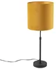 Černá stolní lampa s žlutým sametovým stínítkem a zlatým vnitřkem