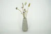 Malá dekorativní váza na suché květiny