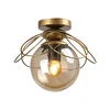 Zlaté stropní svítidlo Alaca od Squid Lighting