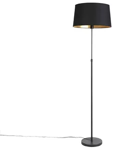 Černá stojací lampa s nastavitelnou výškou a stínítkem