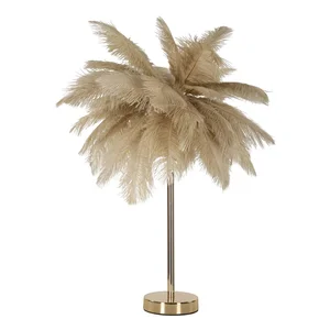 Zlatá stolní lampa Palm Mauro Ferretti