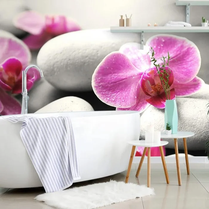 Orchidejové květiny na kamenné tapetě